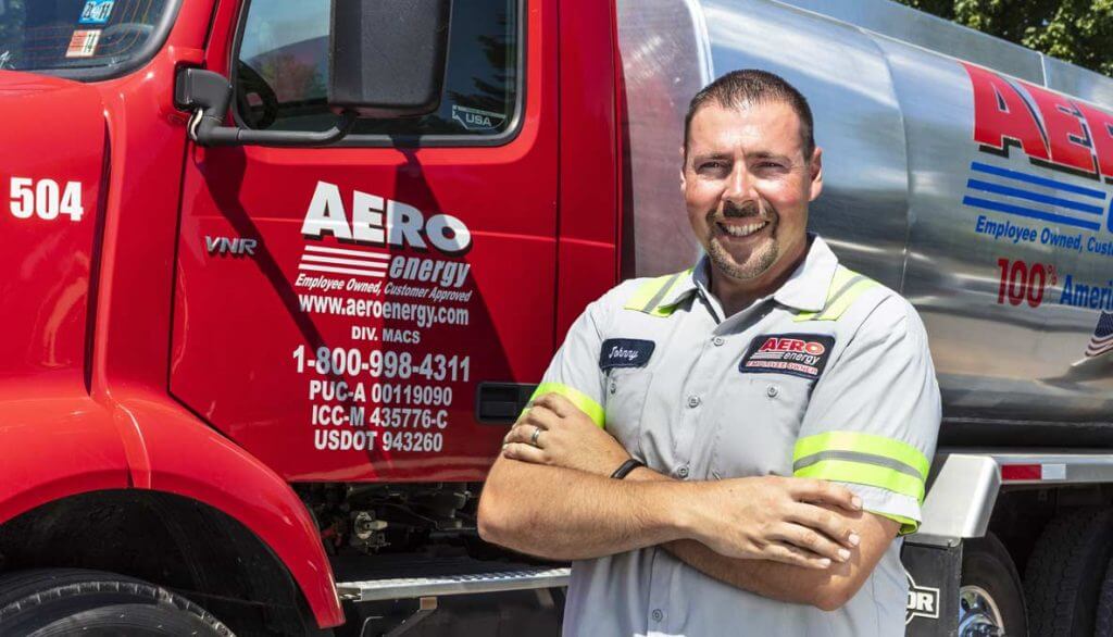 Aero Energy Employee Infront of the Truck